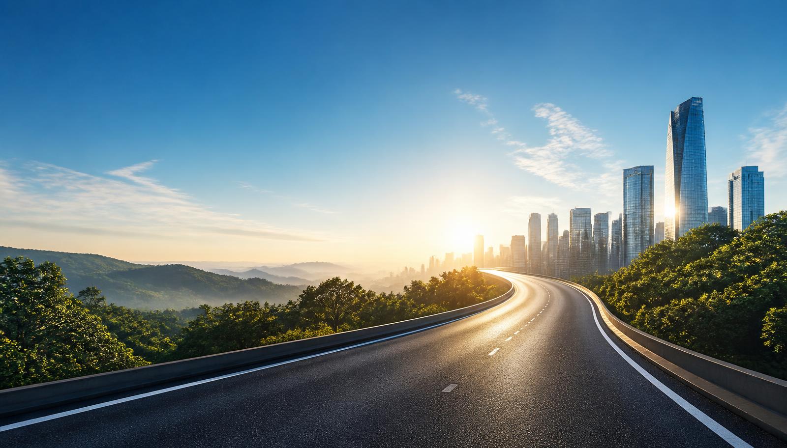 A clear road toward a bright city horizon
